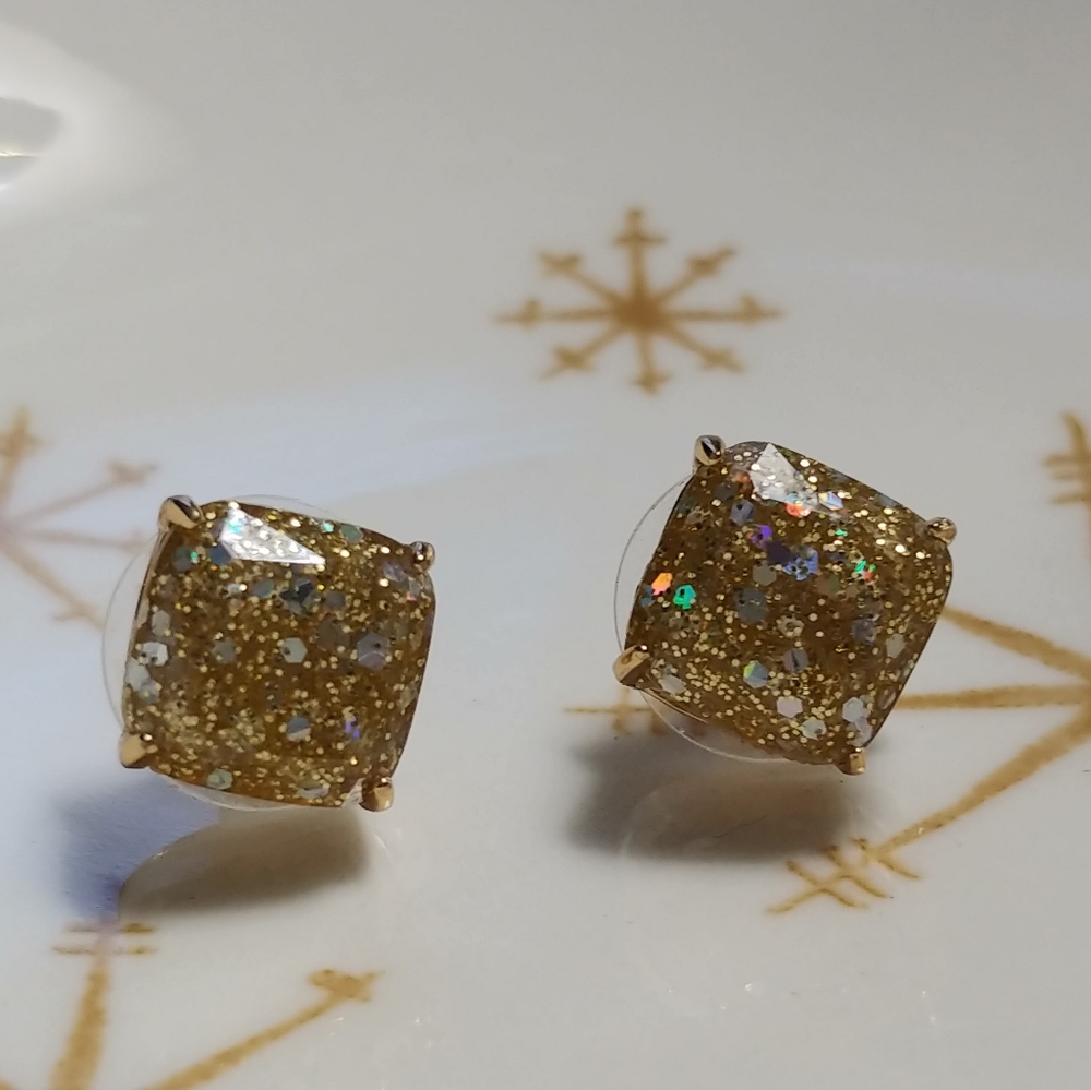 Kate Spade gold glitter studs.